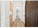 Bright hallway with light wood floors and doors at 3559 Clambank Dr, Mount Pleasant, SC 29466