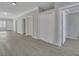 Spacious living area with hardwood floors and multiple access points to other rooms at 1910 Kerry St, North Charleston, SC 29406