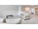 Spacious bonus room with a cozy sitting area, perfect for relaxation at 229 Camellia Bloom Dr, Moncks Corner, SC 29461