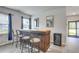 Home bar with rustic wood and three stools at 229 Camellia Bloom Dr, Moncks Corner, SC 29461