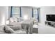 Main bedroom with two armchairs and a TV at 229 Camellia Bloom Dr, Moncks Corner, SC 29461