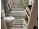 Updated bathroom with new bathtub, toilet, flooring and granite vanity at 5309 Good St, North Charleston, SC 29406