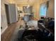 Open concept living area with hardwood floors and kitchen island at 5309 Good St, North Charleston, SC 29406