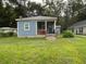 Quaint bungalow with a covered porch and yard at 5309 Good St, North Charleston, SC 29406