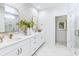 Elegant bathroom with double vanity, marble floors, and walk-in shower at 301 Claret Cup Way, Charleston, SC 29414