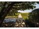 Wooden dock extending over serene marsh, leading to open water views at 1311 S Jenkins Lagoon Dr, Seabrook Island, SC 29455