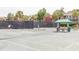 People playing tennis on a green court at 1311 S Jenkins Lagoon Dr, Seabrook Island, SC 29455