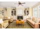 Bright living room with built-in shelving and comfortable seating at 1311 S Jenkins Lagoon Dr, Seabrook Island, SC 29455