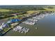 Aerial view of a marina with many boats and homes at 1311 S Jenkins Lagoon Dr, Seabrook Island, SC 29455