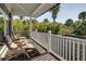 Relaxing screened porch with outdoor furniture at 1311 S Jenkins Lagoon Dr, Seabrook Island, SC 29455