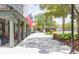 Quaint walkway with American flags, showcasing shops and restaurants in Freshfields Village at 1311 S Jenkins Lagoon Dr, Seabrook Island, SC 29455