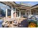 Relaxing deck with seating area and grill, perfect for outdoor entertaining at 1311 S Jenkins Lagoon Dr, Seabrook Island, SC 29455