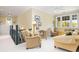 Upstairs sitting area with comfy seating and natural light at 1311 S Jenkins Lagoon Dr, Seabrook Island, SC 29455