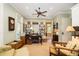 Home office with built-in shelving and hardwood floors at 1311 S Jenkins Lagoon Dr, Seabrook Island, SC 29455