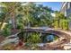 Serene pond with lush landscaping, creating a tranquil outdoor oasis at 1311 S Jenkins Lagoon Dr, Seabrook Island, SC 29455