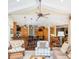 Open concept kitchen with island and breakfast bar, hardwood floors at 1311 S Jenkins Lagoon Dr, Seabrook Island, SC 29455