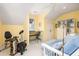 Home office features a desk, exercise bike and futon at 1311 S Jenkins Lagoon Dr, Seabrook Island, SC 29455