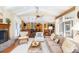 Open concept kitchen with island and breakfast bar, hardwood floors at 1311 S Jenkins Lagoon Dr, Seabrook Island, SC 29455