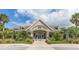 Stunning clubhouse exterior with inviting landscaping and grand entrance at 1311 S Jenkins Lagoon Dr, Seabrook Island, SC 29455