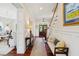 Elegant entryway with hardwood floors, bench seating, and staircase at 738 Hibbens Grant Blvd, Mount Pleasant, SC 29464