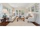 Living room with hardwood floors, comfortable seating, and a chandelier at 738 Hibbens Grant Blvd, Mount Pleasant, SC 29464