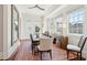 Spacious dining room with rustic wooden table and large windows at 738 Hibbens Grant Blvd, Mount Pleasant, SC 29464
