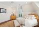 Bright bedroom featuring a comfortable bed and plenty of window light at 738 Hibbens Grant Blvd, Mount Pleasant, SC 29464