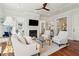 Bright living room with hardwood floors, fireplace, and comfortable seating at 738 Hibbens Grant Blvd, Mount Pleasant, SC 29464