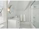 Clean bathroom with a white vanity, tiled floor, and a shower/tub combo at 738 Hibbens Grant Blvd, Mount Pleasant, SC 29464