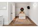 Small bedroom with a simple bed, area rug and a large closet at 738 Hibbens Grant Blvd, Mount Pleasant, SC 29464