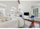 Bright bedroom with hardwood floors, a large bed, and two armchairs at 738 Hibbens Grant Blvd, Mount Pleasant, SC 29464