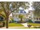 Two-story home with metal roof, palm tree, and walkway at 738 Hibbens Grant Blvd, Mount Pleasant, SC 29464