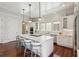 Spacious kitchen with white cabinets, large island, and stainless steel appliances at 738 Hibbens Grant Blvd, Mount Pleasant, SC 29464