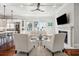 Bright living room with fireplace, hardwood floors, and comfortable seating at 738 Hibbens Grant Blvd, Mount Pleasant, SC 29464