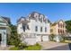 Beautiful two-story home with a white exterior and a two car garage at 738 Hibbens Grant Blvd, Mount Pleasant, SC 29464
