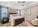 Cozy bedroom with dark wood bed frame, ceiling fan, and area rug at 176 Garden Gate Way, Summerville, SC 29486