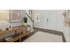 Entryway with a console table, wood floors, and access to the stairs at 1018 Lovebug Ln, Summerville, SC 29485