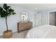Main bedroom with a dresser, mirror, and plenty of space at 1018 Lovebug Ln, Summerville, SC 29485
