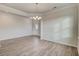 Spacious dining room with hardwood floors and chandelier at 1866 Nola Run, Summerville, SC 29485