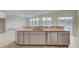 Large kitchen island with granite countertops and stainless steel dishwasher at 1866 Nola Run, Summerville, SC 29485