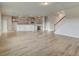 Open concept kitchen with island and grey cabinets at 1866 Nola Run, Summerville, SC 29485