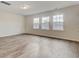 Bright bonus room with hardwood floors and three windows at 1866 Nola Run, Summerville, SC 29485