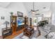 Bright living room features hardwood floors, vaulted ceiling, and a cozy seating area at 1106 Poplar Grove Pl, Summerville, SC 29483