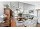 Comfortable living room with hardwood floors and French doors at 1106 Poplar Grove Pl, Summerville, SC 29483