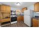 Cozy kitchen featuring wood cabinets and modern appliances at 311 Black St, Walterboro, SC 29488