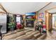 Living room with a fireplace and a large TV at 115 Galloway Ct, Moncks Corner, SC 29461
