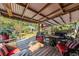 Relaxing back deck with seating area, perfect for outdoor entertaining at 115 Galloway Ct, Moncks Corner, SC 29461