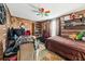 Multifunctional bedroom with gaming setup and a comfortable bed at 115 Galloway Ct, Moncks Corner, SC 29461