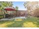 Nice backyard with a large deck and patio furniture at 115 Galloway Ct, Moncks Corner, SC 29461