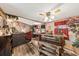 Cozy living room features rustic decor and wood-paneled walls at 115 Galloway Ct, Moncks Corner, SC 29461